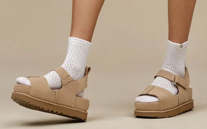 A Person Wearing UGG Goldenstar Platform Sandals