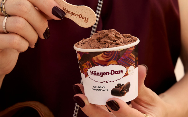 A Woman Holding Haagen Dazs Mini Ice Cream Cup