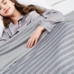A Woman Sleeping with GUOHAOI Cooling Blanket