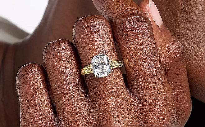 A Woman Wearing Diamonique Classics Cushion Cut Ring in Yellow