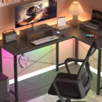 Gtracing L Shaped Gaming Desk with RGB Light in the Room