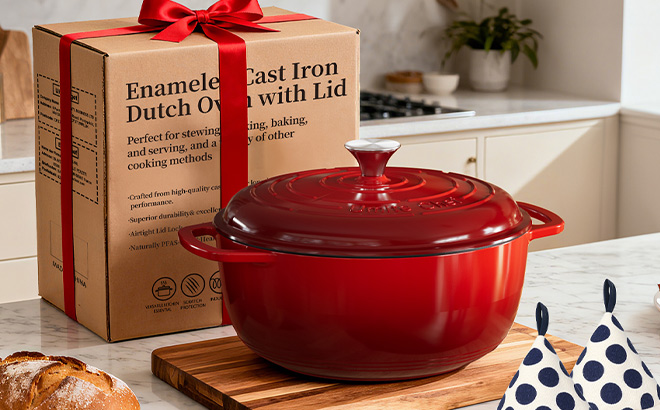 Umite Chef 6 Quart Enameled Cast Iron Dutch Oven in Red Color on the Table