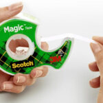 a Person Holding Scotch Magic Tape