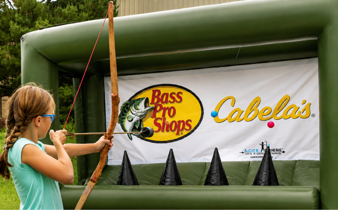 A Girl Doing the Inflatable Target Range Activity