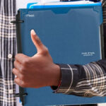 A Person Holding Five Star Flex Refillable Notebook Study App