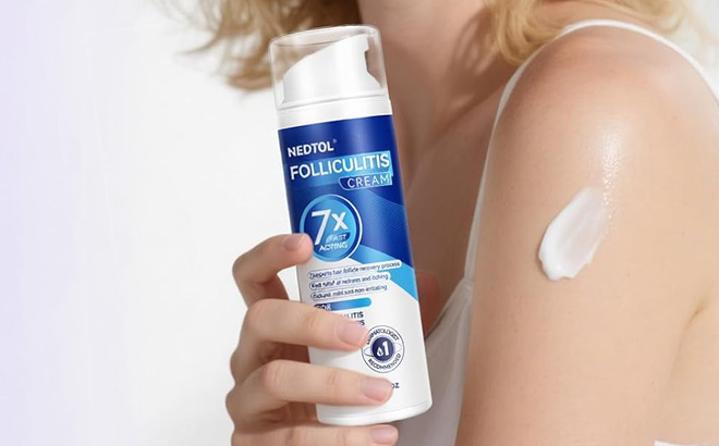 A Person Holding Folliculitis Treatment Cream