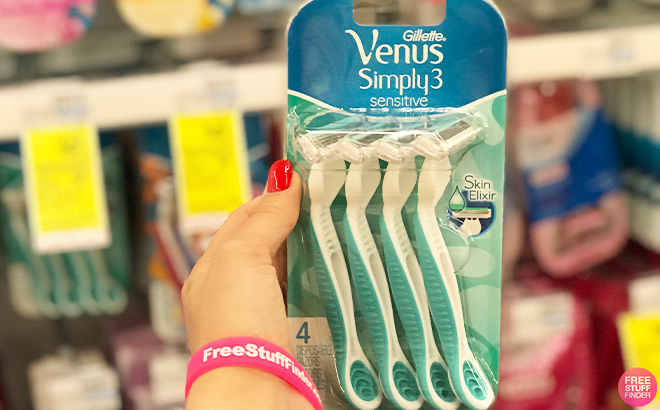 A Person Holding Gillette Venuc Sensitive 3 Blade Disposable Razors