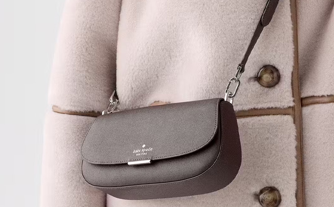 A Person Holding Kate Spade Quinn Mini Crossbody Bag A Person Holding Kate Spade Quinn Mini Crossbody Bag