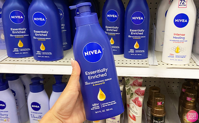 A Person Holding Nivea Essentially Enriched Body Lotion