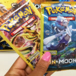 A Person Holding Pokemon Trading Card Games