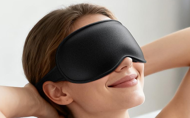 A Person Using 3D Weighted Sleep Mask A Person Using 3D Weighted Sleep Mask