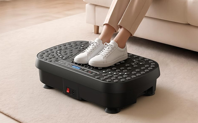 A Person Using Damkee Vibration Plate Machine A Person Using Damkee Vibration Plate Machine