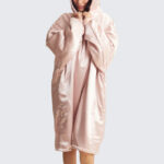 A Person Wearing Glazey Wearable Blanket in Blush Color