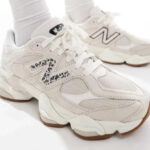 A Person Wearing New Balance 9060 Shoes