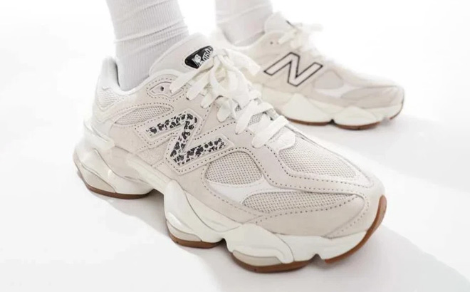 A Person Wearing New Balance 9060 Shoes