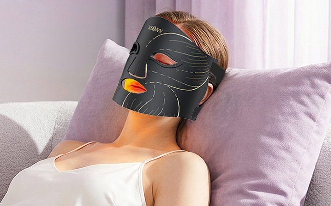 A Woman Using the XSSNVV Red Light Therapy Mask A Woman Using the XSSNVV Red Light Therapy Mask