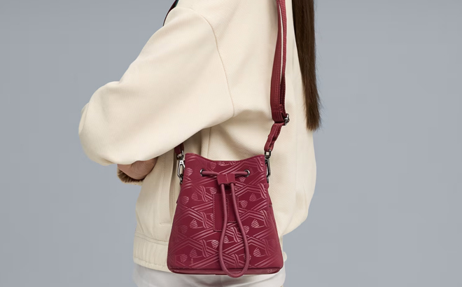 A Woman Wearing Puma Sense Womens Small Bucket Bag A Woman Wearing Puma Sense Womens Small Bucket Bag