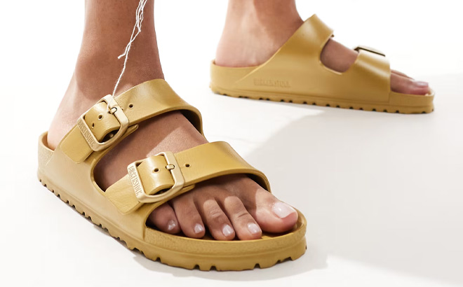 Birkenstock Arizona Essentials EVA Slide Sandals in Gold Color Birkenstock Arizona Essentials EVA Slide Sandals in Gold Color