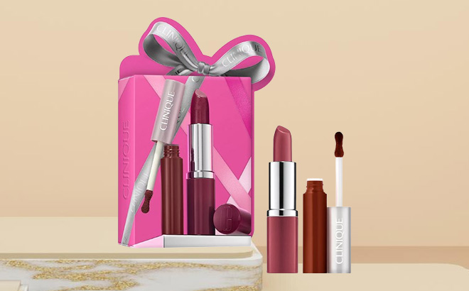 Clinique 2 Piece Pop For Treats Lipstick Lip Gloss Duo Set on the Table