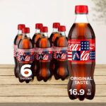 Coca Cola Soda Soft Drink Bottles on the Table