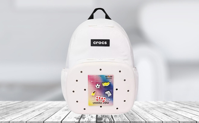 Crocs 17 5 Inch Backpack in White on the Table