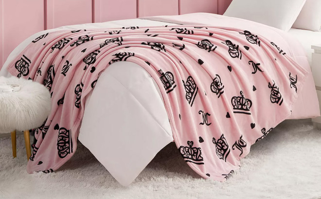 Juicy Couture Plush Throw on the Bed
