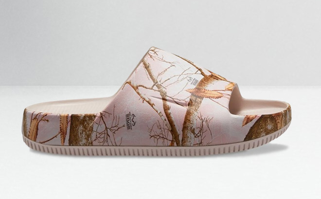Nike Calm Real Tree Womens Slide Sandal on the Table