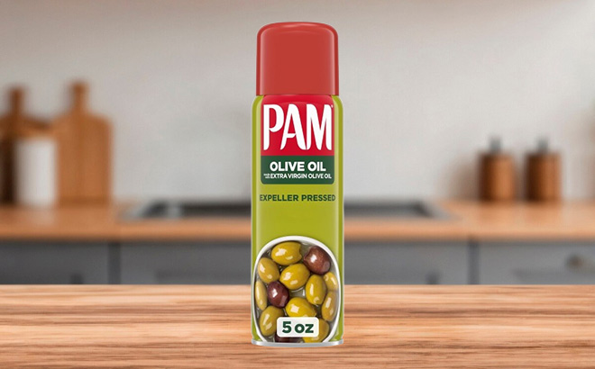 PAM Non Stick Olive Oil Cooking Spray on the Table PAM Non Stick Olive Oil Cooking Spray on the Table