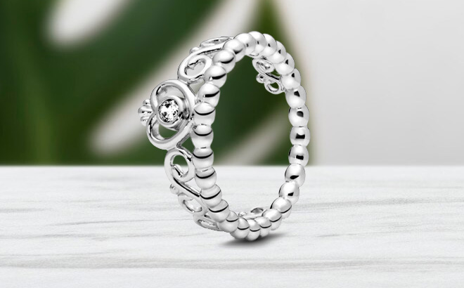 Pandora Cubic Zirconia Moments Princess Tiara Crown Ring on the Table