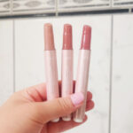 Person Holding Tarte Maracuja Lip Balm Trio