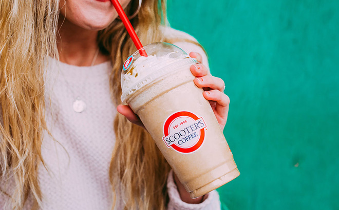 a Peson Drinking Scooters Iced Caramelicious Drink