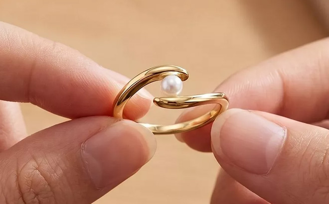 A Person Holding Genevieve Minimalist 14k Gold Plated Dainty Pearl Elegant Slim Band Ring A Person Holding Genevieve Minimalist 14k Gold Plated Dainty Pearl Elegant Slim Band Ring