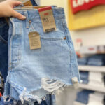 A Person Holding Levis Womens 501 Shorts