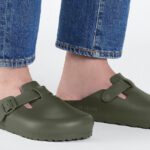A Person Wearing Birkenstock EVA Adjustable Recovery Clogs