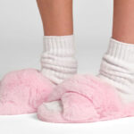A Person Wearing Comfrt Dreamer Crossover Slippers