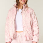 A Person Wearing Hollister Zip Up Pattern Puffer Jacket