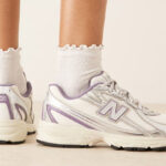 A Person Wearing New Balance 740 Casual Sneakers