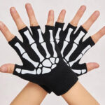 A Person Wearing Skeleton Glow in the Dark Gloves