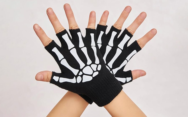 A Person Wearing Skeleton Glow in the Dark Gloves A Person Wearing Skeleton Glow in the Dark Gloves