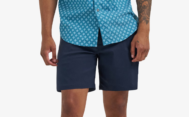 A Person Wearing Wrangler Mens Performance Flat Front Shorts A Person Wearing Wrangler Mens Performance Flat Front Shorts