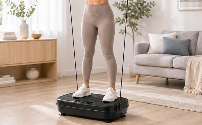 A Woman Using Natini Whole Body Vibration Plate Exercise Machine