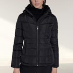 A Woman Wearing Calvin Klein Stand Collar Lined Puffer Jacket