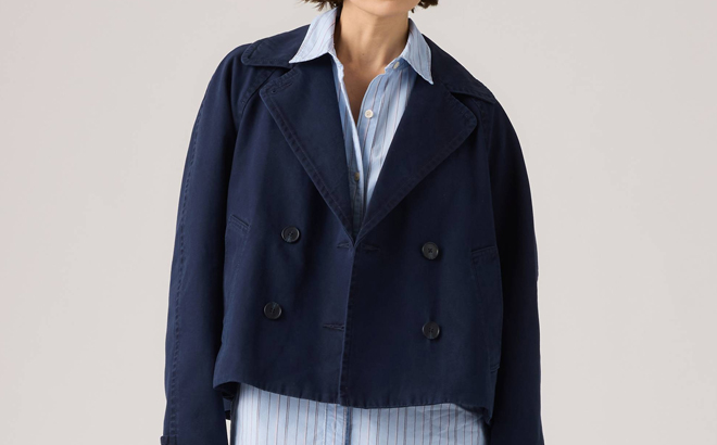 A Woman Wearing Levis Bree Cropped Swing Trench Jacket