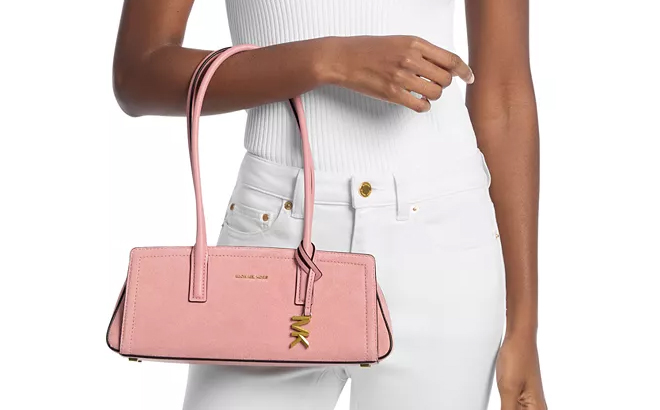A Woman Wearing Michael Kors Laila Medium East West Shoulder Tote Handbag A Woman Wearing Michael Kors Laila Medium East West Shoulder Tote Handbag
