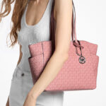 A Woman Wearing Michael Kors Marilyn Medium Signature Logo Tote Bag