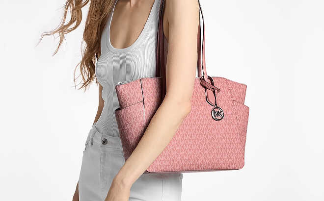 A Woman Wearing Michael Kors Marilyn Medium Signature Logo Tote Bag A Woman Wearing Michael Kors Marilyn Medium Signature Logo Tote Bag