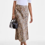 A Woman Wearing On 34th Printed Midi Slip Skirt