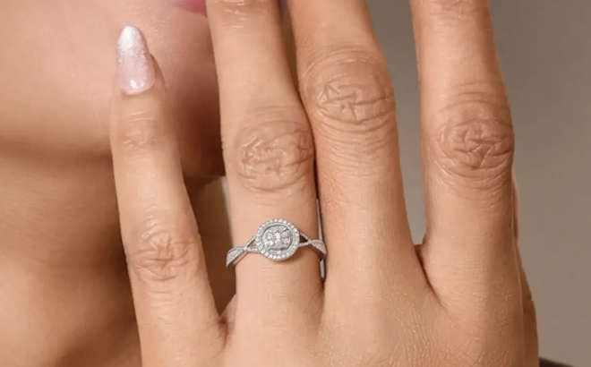A Woman Wearing Zales Diamond Cluster Frame Ring in Sterling Silver
