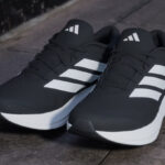 Adidas Runfalcon 6 Cloudfoam Mens Running Shoes on the Ground