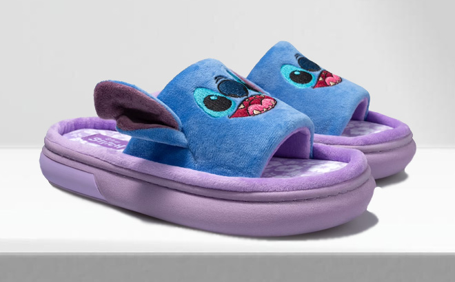 Ground Up Disney Stitch Womens Slide Slippers on the Table